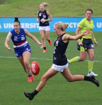 Vanessa Murphy kicks AFL